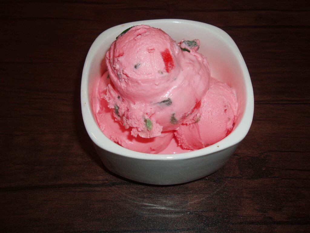 A Cup of Tutti Frutti Ice Cream with 2 scoops